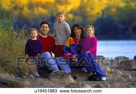 Family portrait by riverside View Large Photo Image Stock Image - Family portrait by riverside. Fotosearch