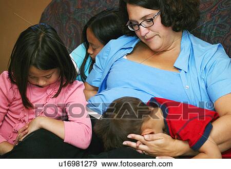 Family prays together View Large Photo Image Stock Photo - Family prays together. Fotosearch