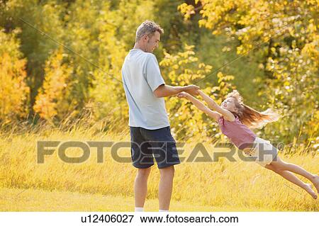 Stock Photo - Father and daughter. Fotosearch