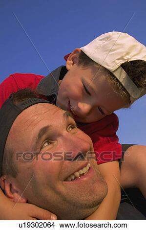Picture - Father and son bonding. Fotosearch