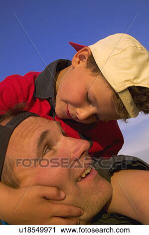 Stock Image - Father and son bonding. Fotosearch
