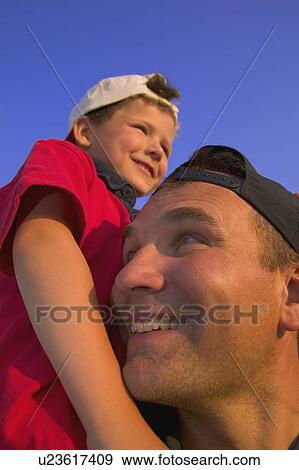 Father and son bonding View Large Photo Image Stock Photo - Father and son bonding. Fotosearch
