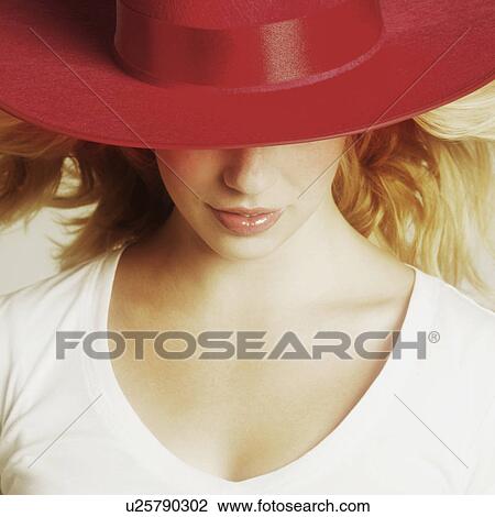 Female model wearing red hat View Large Photo Image Stock Image - Female model wearing red hat. Fotosearch