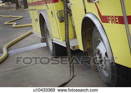 Fire truck and hoses View Large Photo Image Stock Photo - Fire truck and hoses. Fotosearch