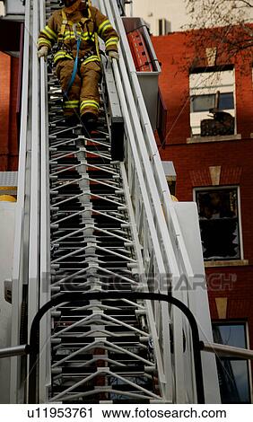 Fireman coming down ladder View Large Photo Image Stock Image - Fireman coming down ladder. Fotosearch