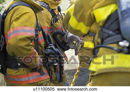 Firemen talking View Large Photo Image Stock Photography - Firemen talking. Fotosearch