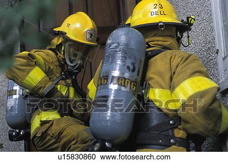 Firemen with masks outside building View Large Photo Image Stock Image - Firemen with masks outside building. Fotosearch