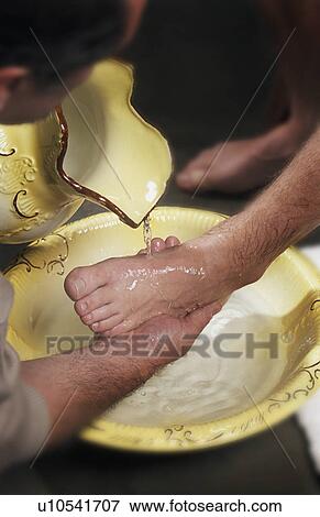 Foot washing View Large Photo Image Stock Photo - Foot washing. Fotosearch