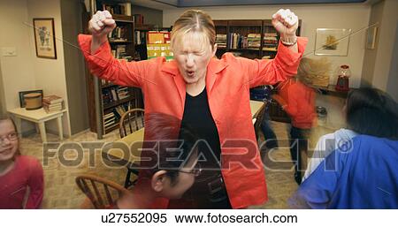 Stock Photography - Fraught teacher. Fotosearch