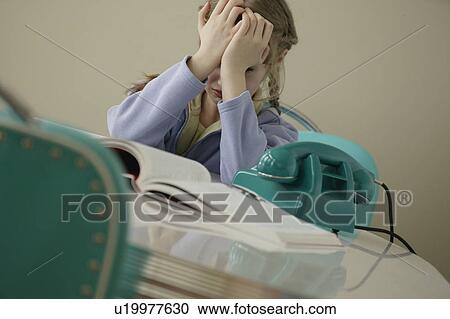 Girl frustrated about homework View Large Photo Image Stock Image - Girl frustrated about homework. Fotosearch