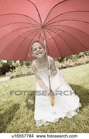 Picture - Girl with umbrella. Fotosearch