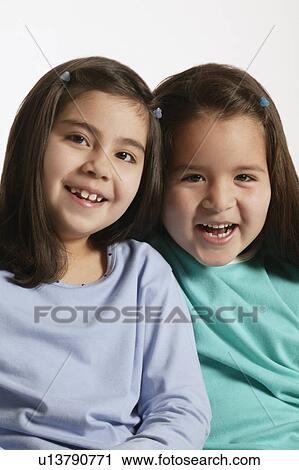 Girls smile together View Large Photo Image Stock Image - Girls smile together. Fotosearch