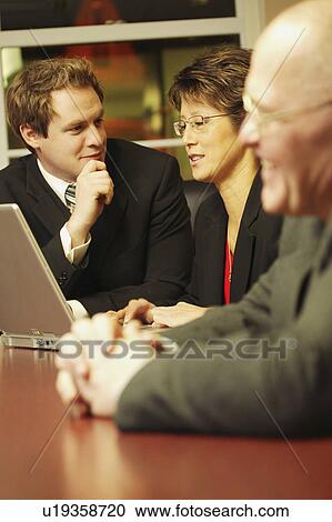 Stock Image - Group of business people. Fotosearch