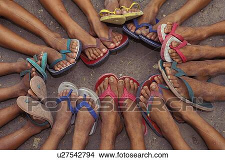 Group of feet in sandals View Large Photo Image Picture - Group of feet in sandals. Fotosearch