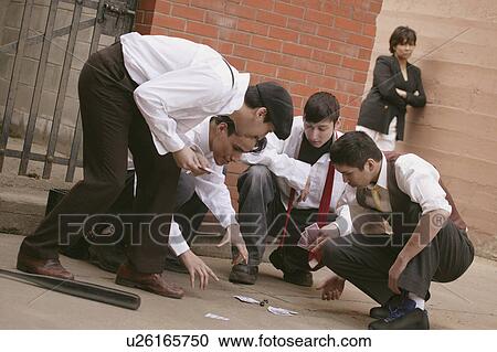 Group of guys playing cards View Large Photo Image Stock Image - Group of guys playing cards. Fotosearch