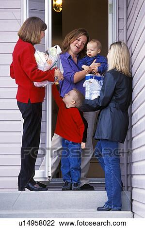 Group of women friends chatting on the doorstep View Large Photo Image Stock Image - Group of women friends chatting on the doorstep. Fotosearch