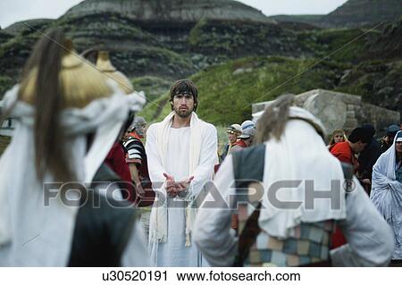 Stock Image - Guards come to arrest Jesus in the garden of Gethsemane. Fotosearch