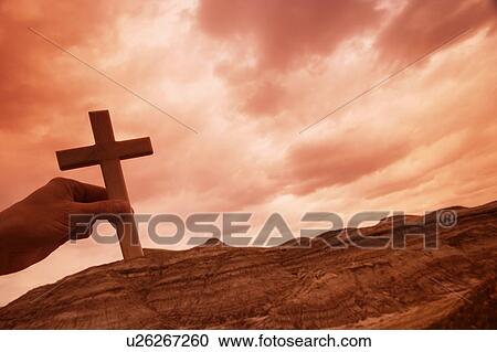 Hand holding a cross View Large Photo Image Stock Image - Hand holding a cross. Fotosearch