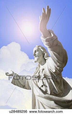 Stock Photograph - Hands stretched towards heaven. Fotosearch