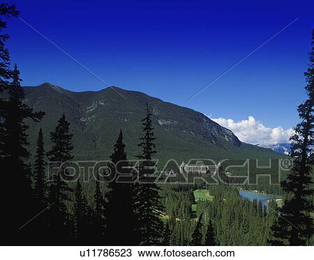 Stock Image - Hotel and golf course in mountain valley Banff Springs Hotel Banff National Park Alberta. Fotosearch