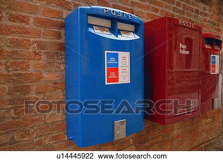 Italian mailboxes hanging on a brick wall in Italy Europe View Large Photo Image Stock Image - Italian mailboxes hanging on a brick wall in Italy Europe. Fotosearch