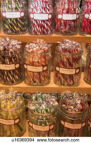 Picture - Jars of candy sticks. Fotosearch
