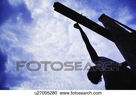 Stock Image - Jesus hanging on the cross. Fotosearch
