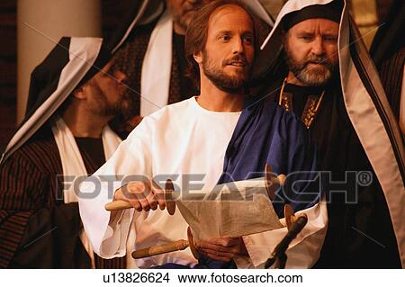 Picture - Jesus reads from the scroll. Fotosearch