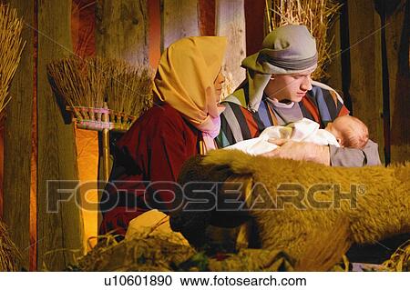 Stock Image - Joseph and Mary with baby Jesus. Fotosearch