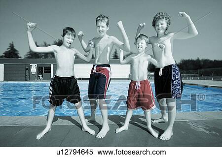 Stock Photography - Kids flexing muscles. Fotosearch
