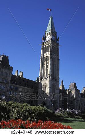 Large buildings and clock tower View Large Photo Image Stock Photo - Large buildings and clock tower. Fotosearch