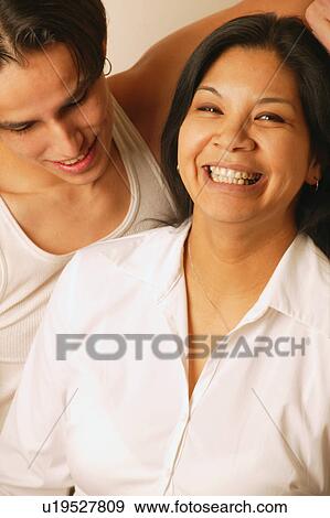 Stock Photo - Laughing couple. Fotosearch