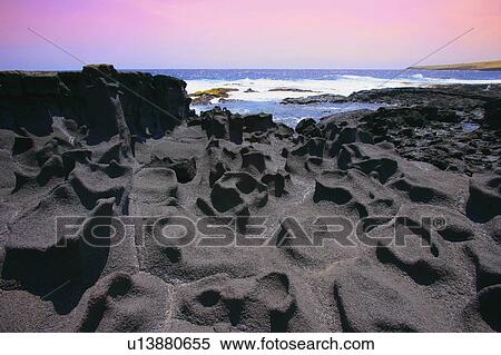 Stock Photography - Lava rock near water. Fotosearch