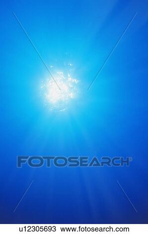 Light shining through water View Large Photo Image Stock Image - Light shining through water. Fotosearch
