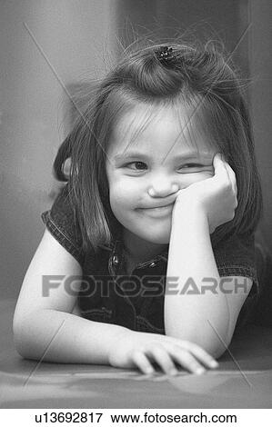 Stock Photo - Little girl with a silly expression. Fotosearch