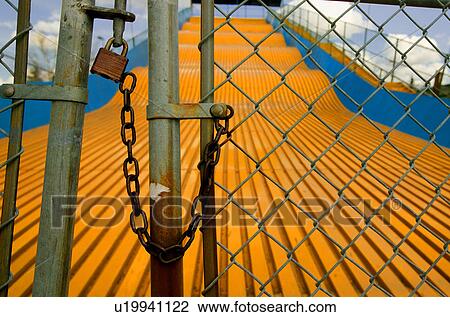 Locked up slide at amusement park View Large Photo Image Stock Image - Locked up slide at amusement park. Fotosearch