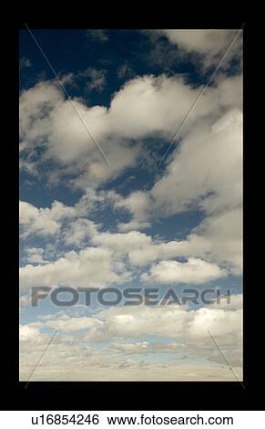 Looking out window at clouds View Large Photo Image Stock Photograph - Looking out window at clouds. Fotosearch