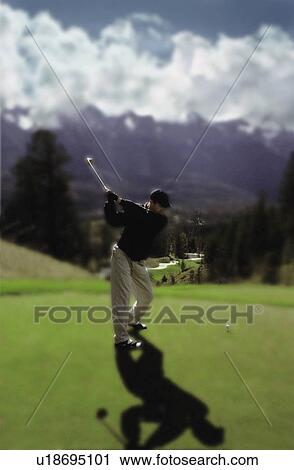 Man driving golf ball View Large Photo Image Stock Image - Man driving golf ball. Fotosearch