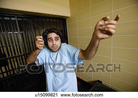 Man in hospital gown View Large Photo Image Stock Image - Man in hospital gown. Fotosearch