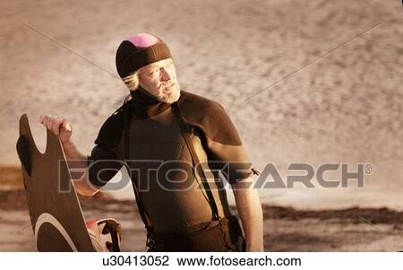 Man in wetsuit View Large Photo Image Stock Image - Man in wetsuit. Fotosearch