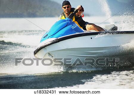 Man on a sea-doo View Large Photo Image Stock Image - Man on a sea-doo. Fotosearch