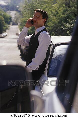 Man on cell phone View Large Photo Image Stock Photography - Man on cell phone. Fotosearch