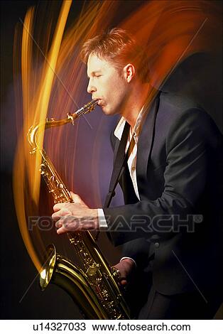 Man playing saxophone View Large Photo Image Stock Image - Man playing saxophone. Fotosearch