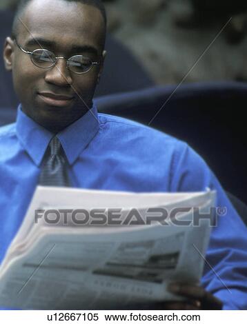 Man reading newspaper View Large Photo Image Stock Photography - Man reading newspaper. Fotosearch