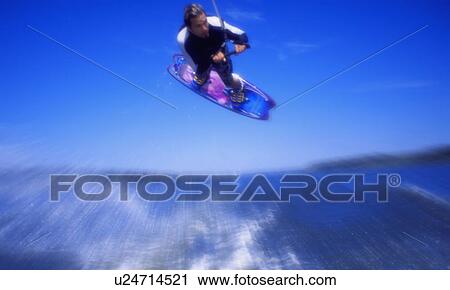 Man wakeboarding Coal Lake Alberta Canada View Large Photo Image Stock Image - Man wakeboarding Coal Lake Alberta Canada. Fotosearch