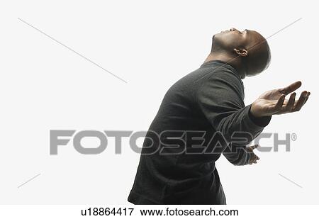 Stock Photo - Man with arms raised. Fotosearch