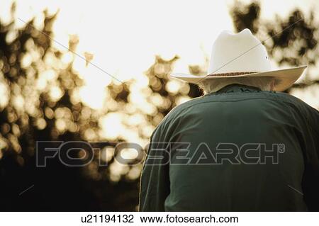 Stock Image - Man with cowboy hat. Fotosearch