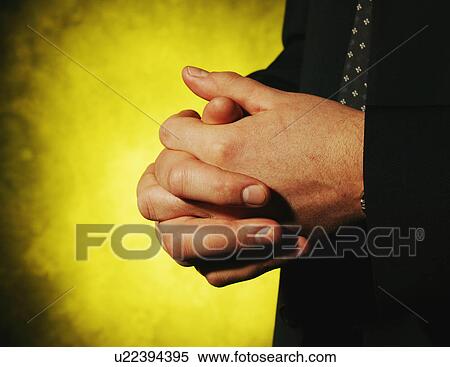 Man with folded hands View Large Photo Image Stock Photography - Man with folded hands. Fotosearch