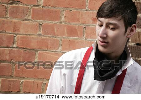 Man with red suspenders View Large Photo Image Picture - Man with red suspenders. Fotosearch