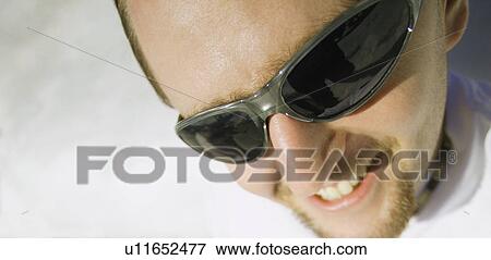 Man with sunglasses View Large Photo Image Stock Photo - Man with sunglasses. Fotosearch